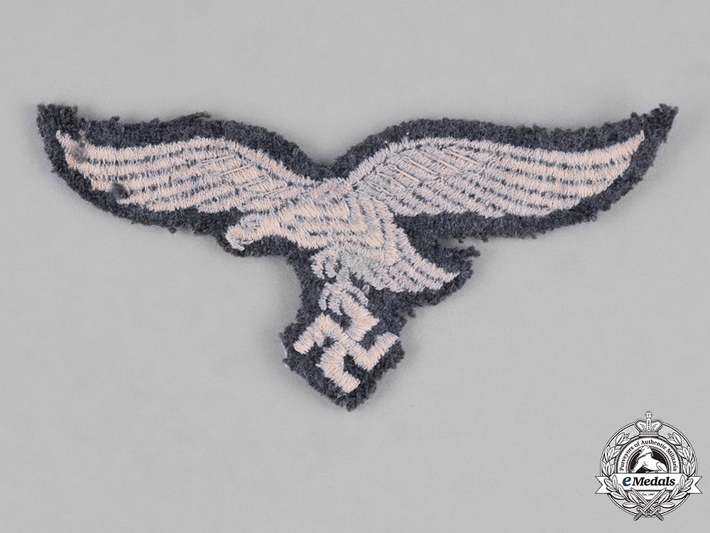 germany,_luftwaffe._a_group_of_uniform_insignia_c18-034559