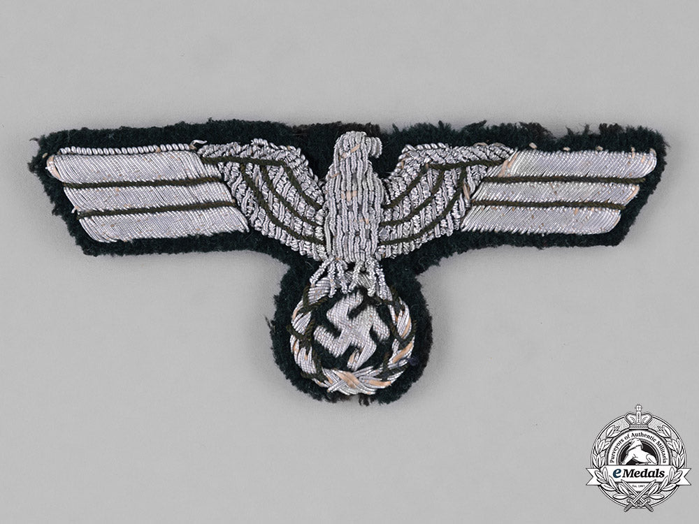 germany,_wehrmacht._a_pair_of_second_war_period_wehrmacht_insignia_c18-034609