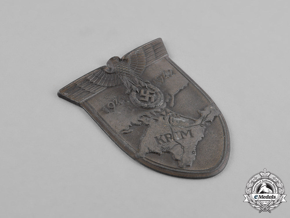germany,_wehrmacht._a_pair_of_second_war_period_wehrmacht_insignia_c18-034614