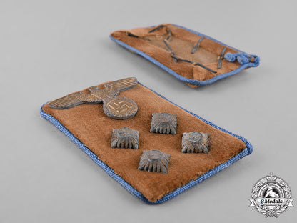 germany,_nsdap._a_pair_of_rzm-_marked_nsdap_ortsgruppe_gemeinschaftsleiter_collar_tabs_c18-034621