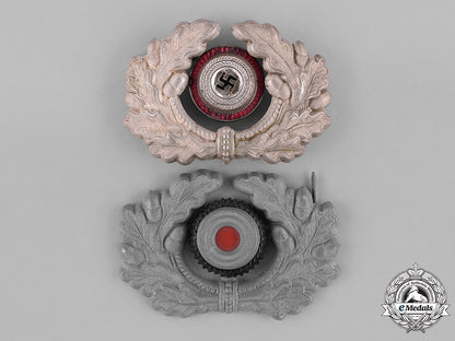 germany,_third_reich._a_grouping_of_third_reich_visor_cap_insignia_c18-034668