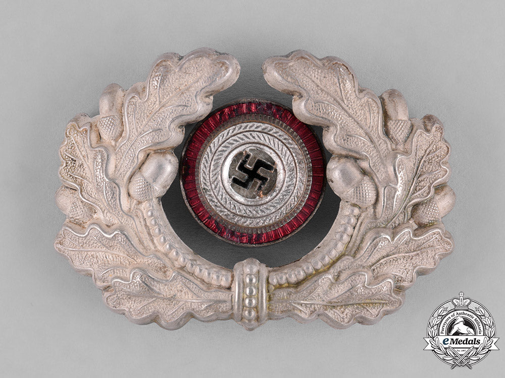 germany,_third_reich._a_grouping_of_third_reich_visor_cap_insignia_c18-034669