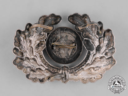 germany,_third_reich._a_grouping_of_third_reich_visor_cap_insignia_c18-034670