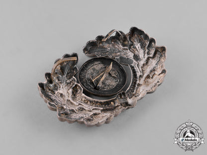 germany,_third_reich._a_grouping_of_third_reich_visor_cap_insignia_c18-034671
