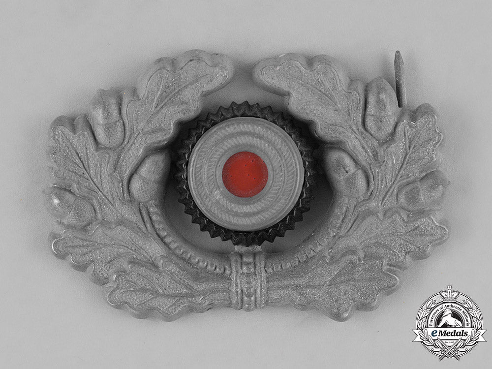 germany,_third_reich._a_grouping_of_third_reich_visor_cap_insignia_c18-034673