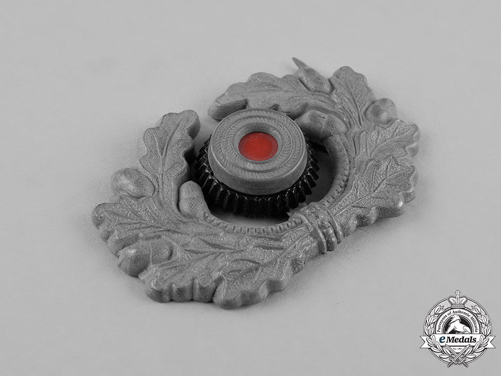 germany,_third_reich._a_grouping_of_third_reich_visor_cap_insignia_c18-034676