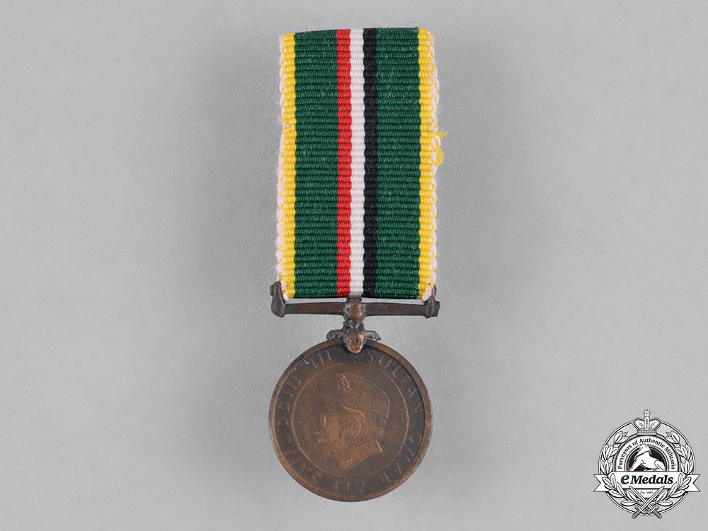 brunei._royal_brunei_malay_regiment_long_service_and_good_conduct_medal_by_spink_of_london_c18-035308