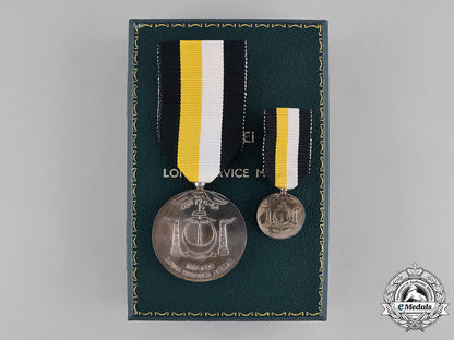 brunei._long_service_medal_by_spink_of_london_c18-035316
