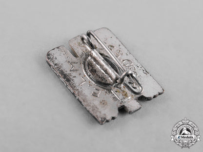 germany,_third_reich._a_group_of_third_reich_period_organization_membership_badges_c18-035665