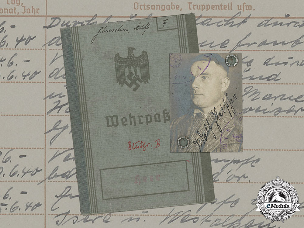 germany,_heer._a_wehrpaß_and_wehrmacht-_führerschein_to_gefreiter_adolf_fleischer_c18-035810