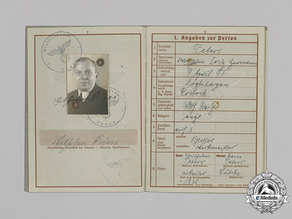 germany,_third_reich._a_wehrpaß_and_document_grouping_of_wilhelm_peters_c18-035918