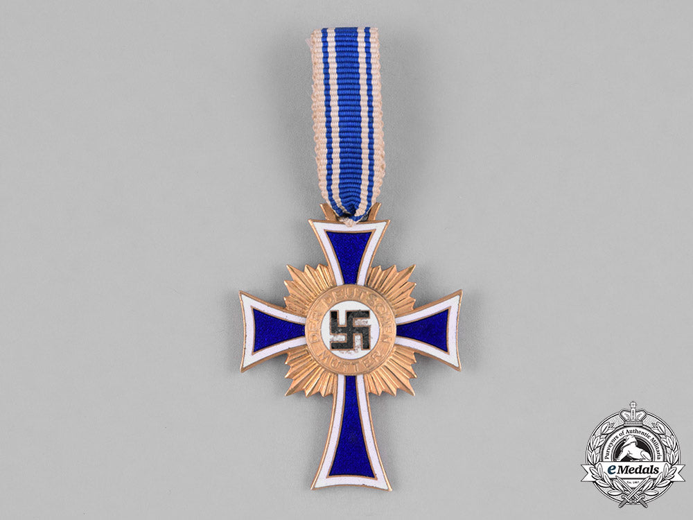 germany,_third_reich._an_honour_cross_of_the_german_mother,_gold_grade_with_miniature_by_wilhelm_deumer_c18-036193