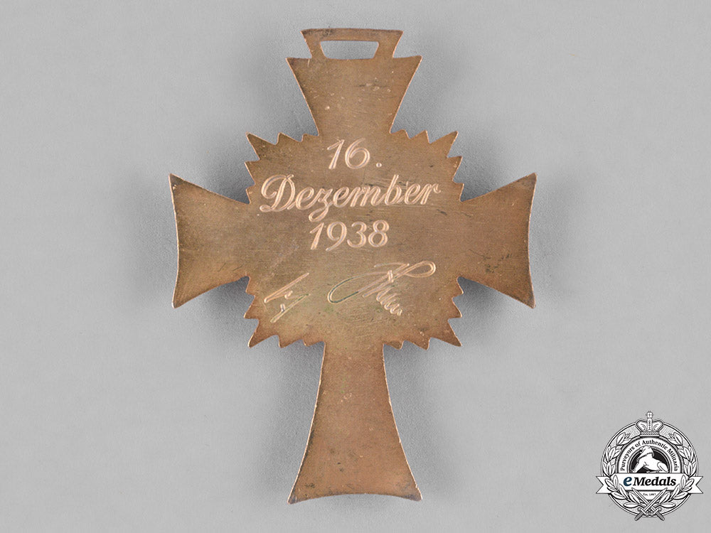 germany,_third_reich._an_honour_cross_of_the_german_mother,_gold_grade_with_miniature_by_wilhelm_deumer_c18-036195