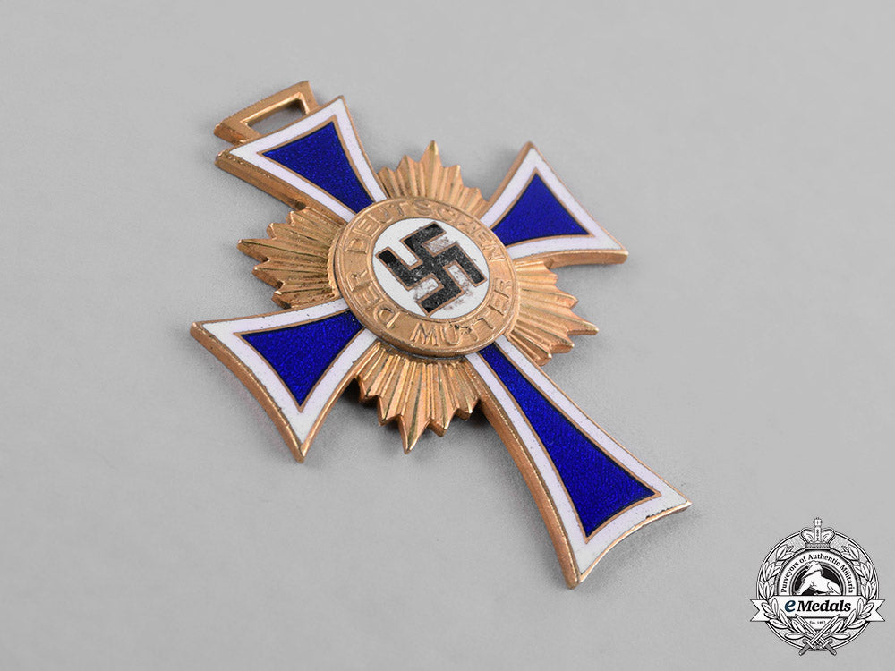 germany,_third_reich._an_honour_cross_of_the_german_mother,_gold_grade_with_miniature_by_wilhelm_deumer_c18-036197