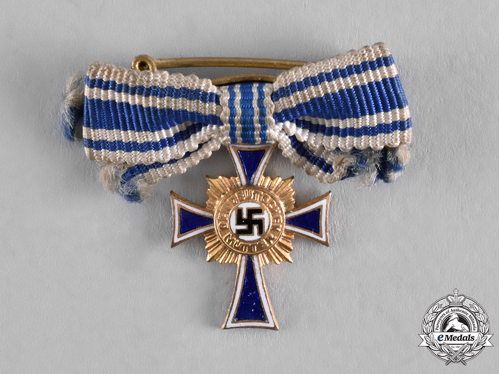 germany,_third_reich._an_honour_cross_of_the_german_mother,_gold_grade_with_miniature_by_wilhelm_deumer_c18-036198