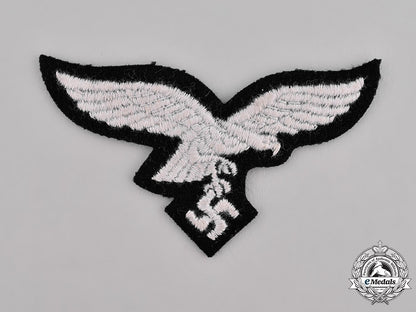 germany,_luftwaffe._a_luftwaffe_breast_eagle_for_an_em/_nco_of_the1_st_fallschirm-_panzer_division_hermann_göring_c18-036865