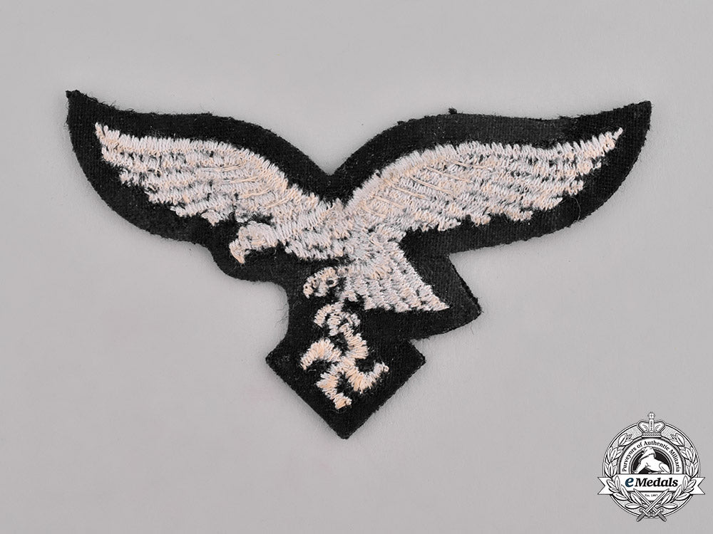 germany,_luftwaffe._a_luftwaffe_breast_eagle_for_an_em/_nco_of_the1_st_fallschirm-_panzer_division_hermann_göring_c18-036866