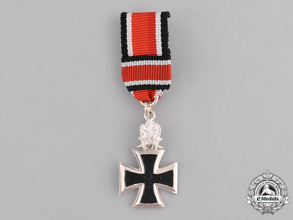 germany,_federal_republic._a_miniature_knight’s_cross_of_the_iron_cross_with_swords/_oak_leaves_stickpin,1957_reissue_c18-036966