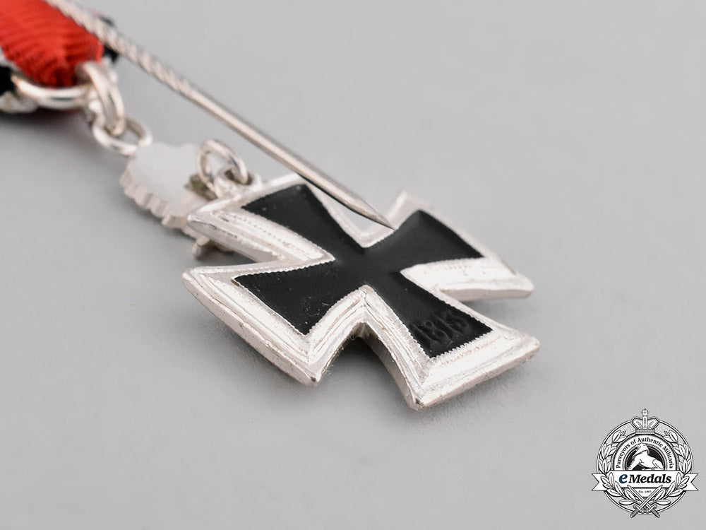 germany,_federal_republic._a_miniature_knight’s_cross_of_the_iron_cross_with_swords/_oak_leaves_stickpin,1957_reissue_c18-036968