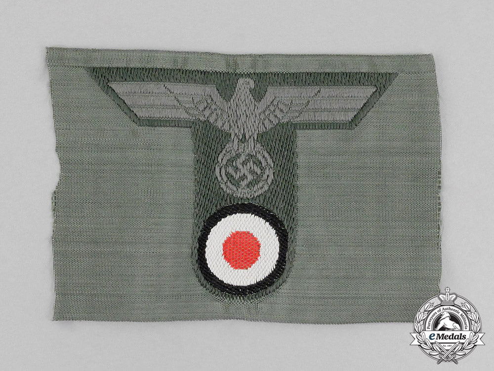 germany._a_mint_and_unissued_wehrmacht_heer(_army)_field_cap_insignia_c18-0374