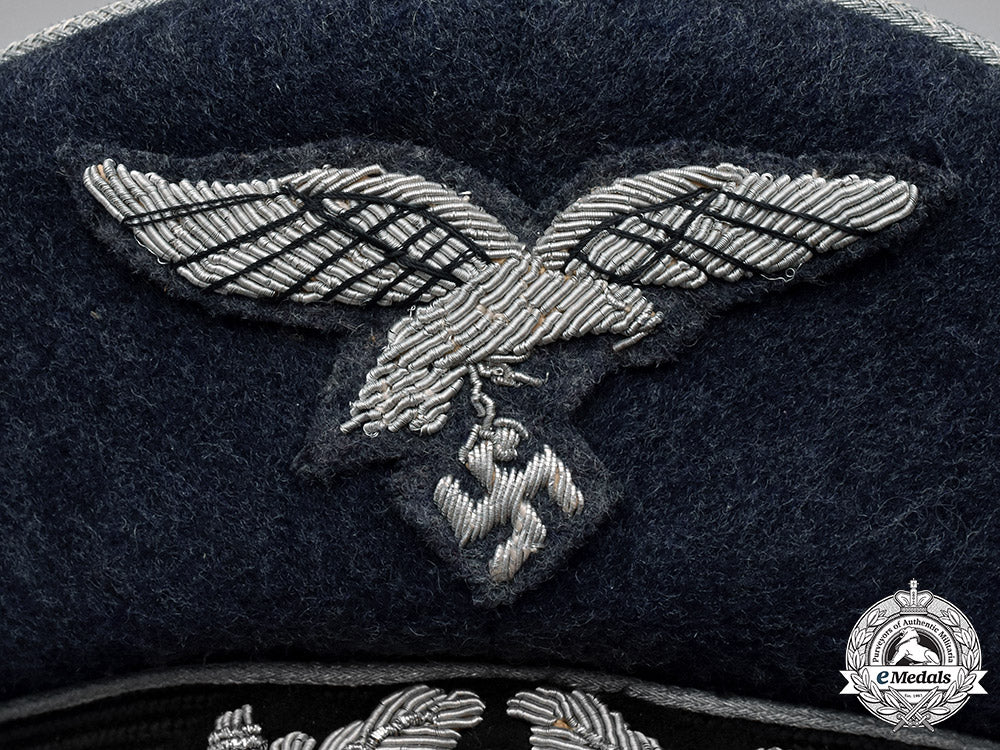 germany,_luftwaffe._an_officer’s_visor_cap,_by_c.e._has_prima_c18-037439