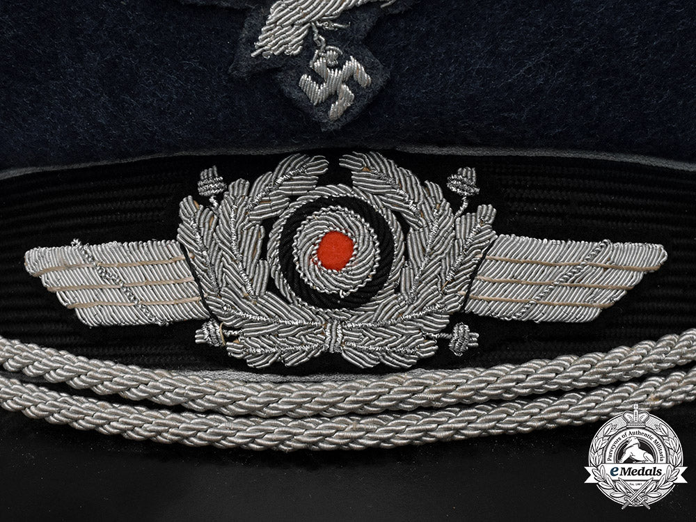 germany,_luftwaffe._an_officer’s_visor_cap,_by_c.e._has_prima_c18-037440