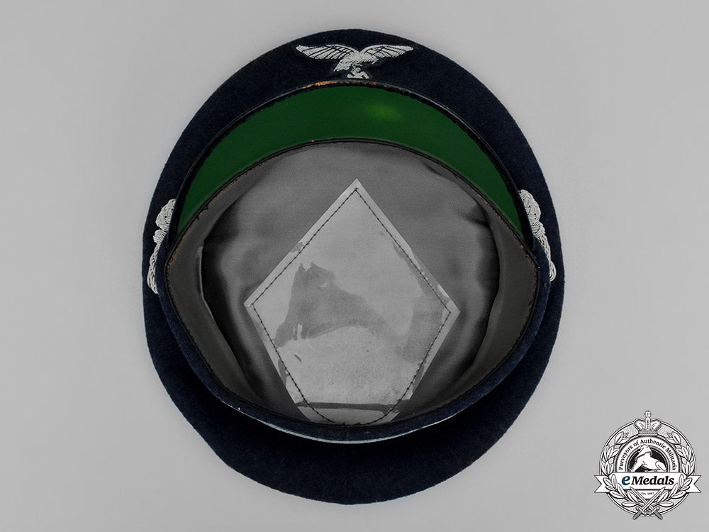 germany,_luftwaffe._an_officer’s_visor_cap,_by_c.e._has_prima_c18-037441