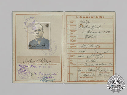 germany,_heer._a_wehrpaß_and_documents_belonging_to_erhard_pflüger_c18-037502