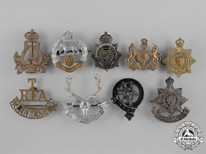 united_kingdom._nine_first_war_cap_badges_c18-037933