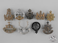 United Kingdom. Nine First War Cap Badges
