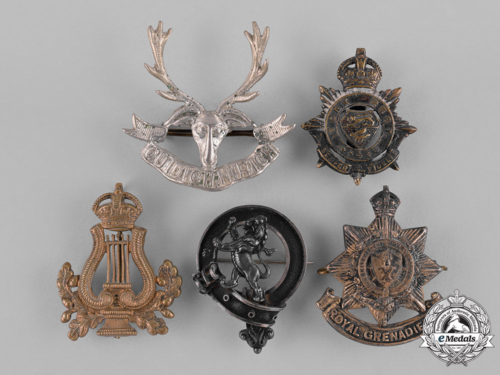united_kingdom._nine_first_war_cap_badges_c18-037934
