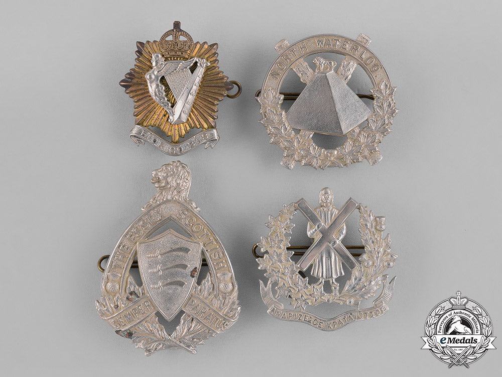 canada._a_lot_of_four_pre-_first_and_second_war_cap_badges_c18-037957