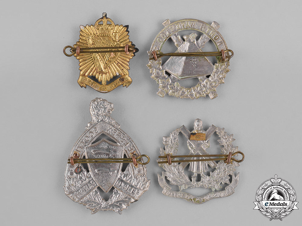 canada._a_lot_of_four_pre-_first_and_second_war_cap_badges_c18-037958