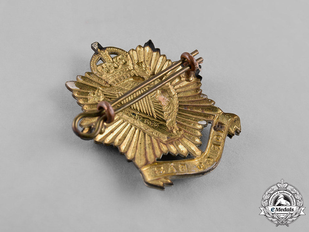 canada._a_lot_of_four_pre-_first_and_second_war_cap_badges_c18-037959