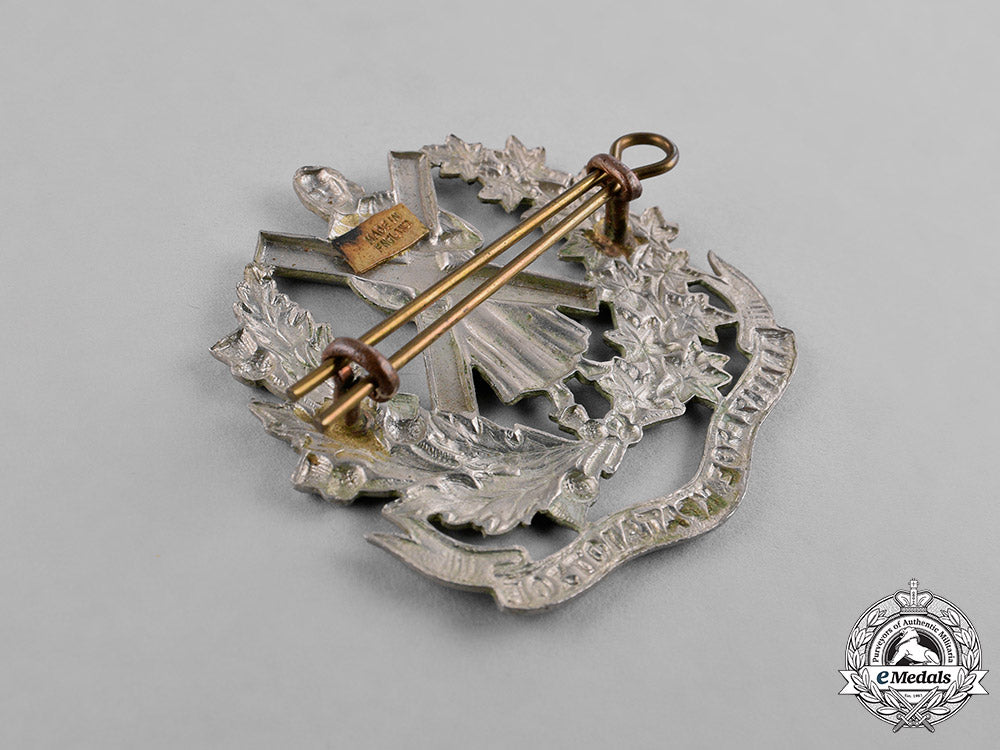 canada._a_lot_of_four_pre-_first_and_second_war_cap_badges_c18-037962