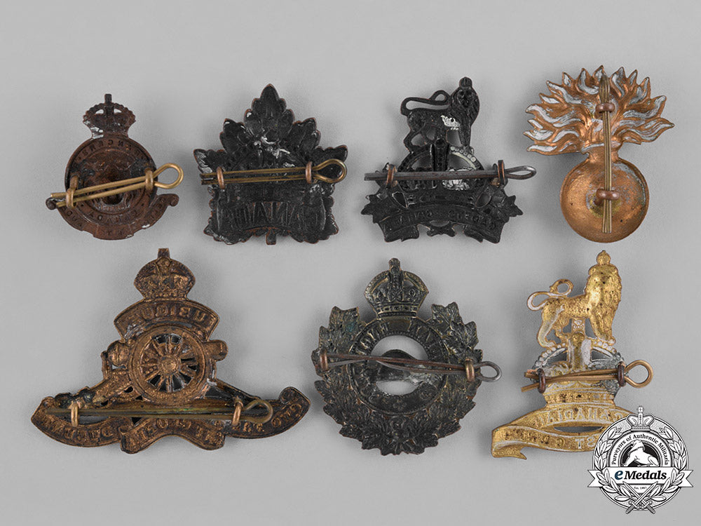 canada._a_lot_of_seven_first_and_second_war_cap_badges_c18-037965