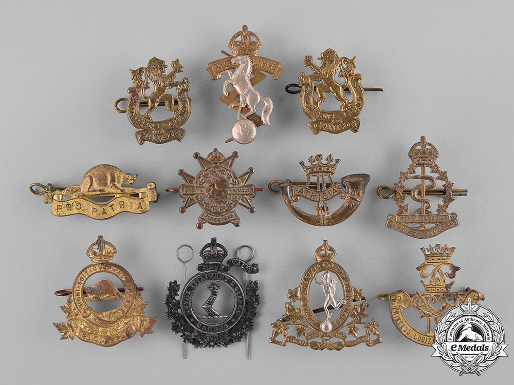 canada._a_lot_of_eleven_second_war_cap_badges_and_collar_tabs_c18-037984