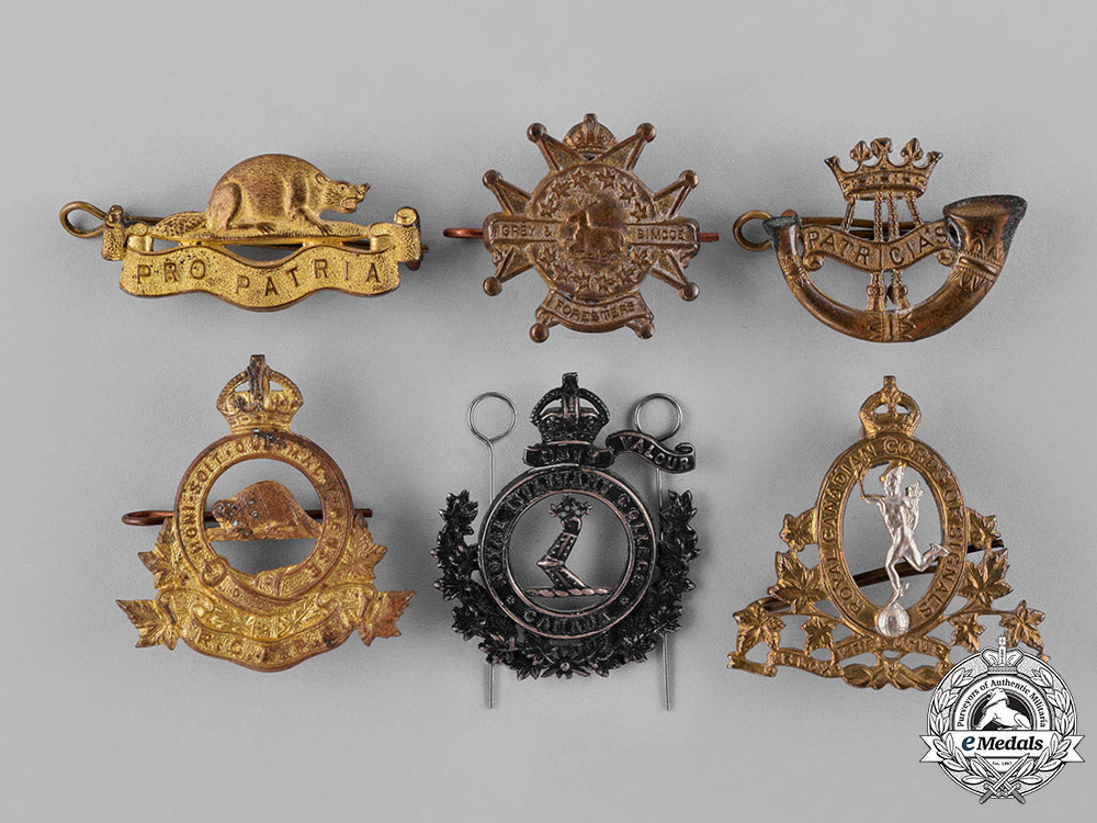 canada._a_lot_of_eleven_second_war_cap_badges_and_collar_tabs_c18-037985