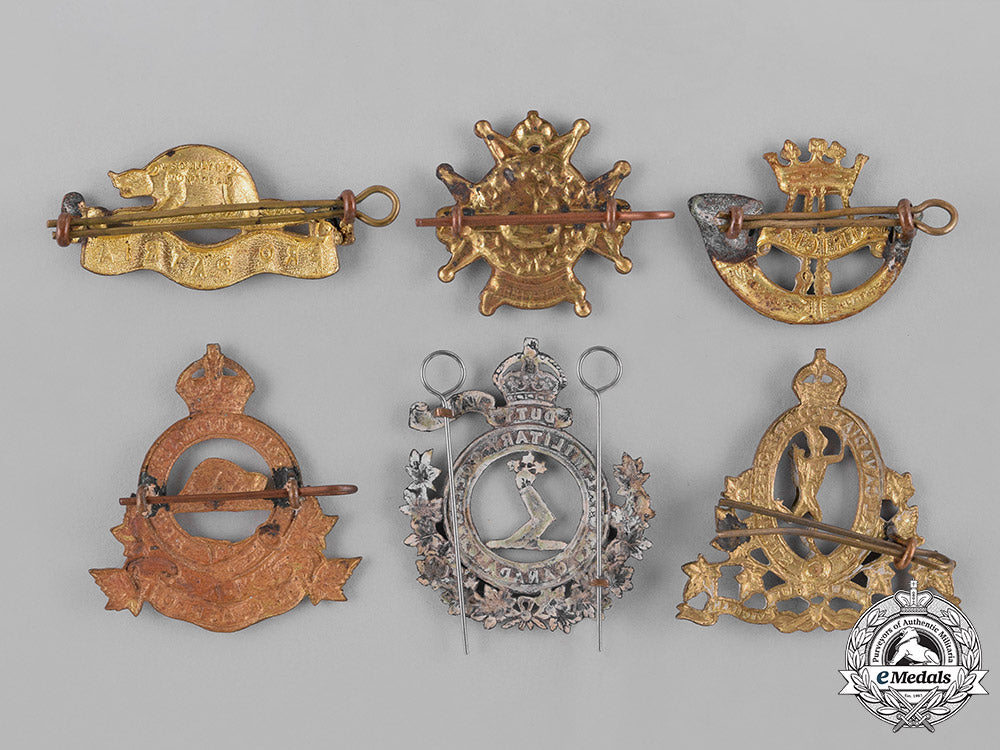 canada._a_lot_of_eleven_second_war_cap_badges_and_collar_tabs_c18-037986