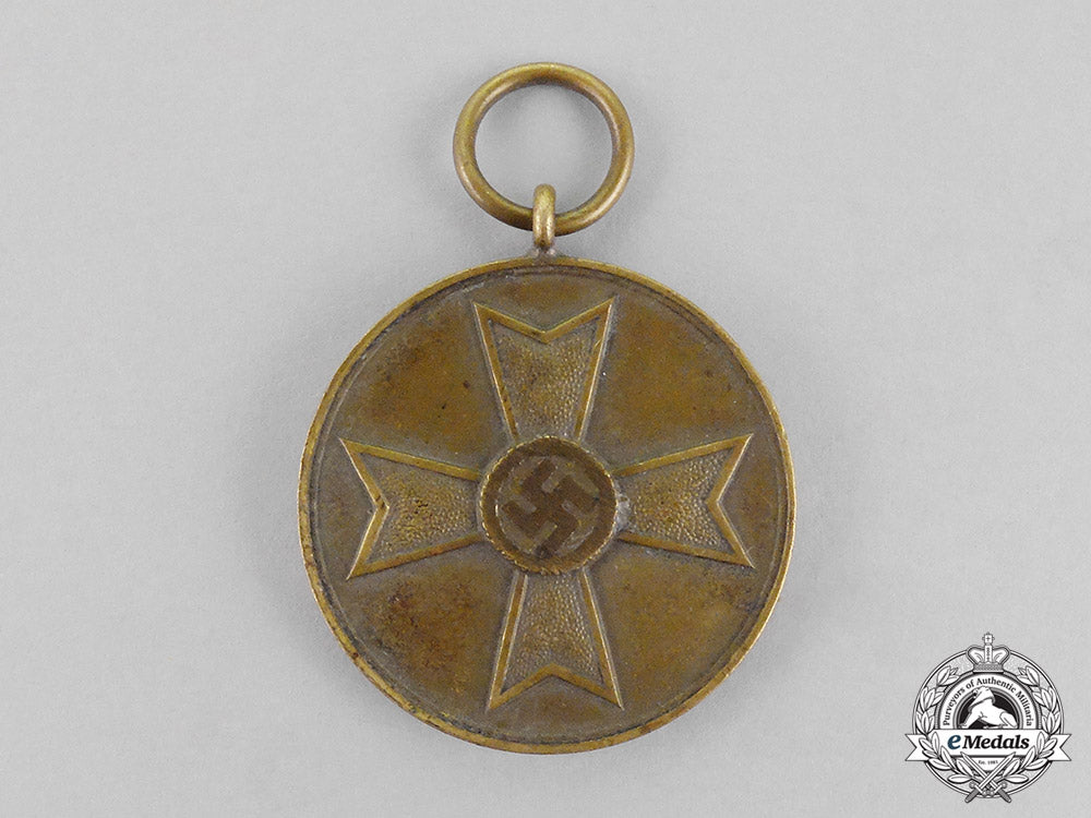 germany.._a_war_merit_medal_with_its_period_original_ribbon_c18-0380