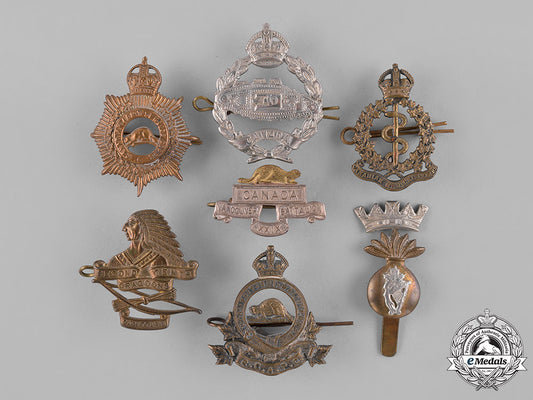 canada._a_lot_of_seven_first_and_second_war_cap_badges_c18-038020