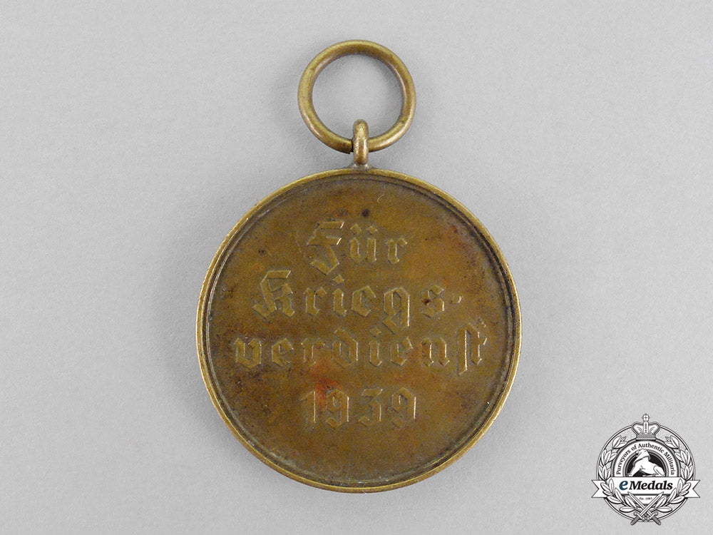 germany.._a_war_merit_medal_with_its_period_original_ribbon_c18-0381