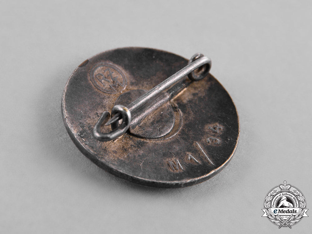 germany,_nsdap._a_nsdap_member_lapel_badge_by_karl_wurster_c18-039713