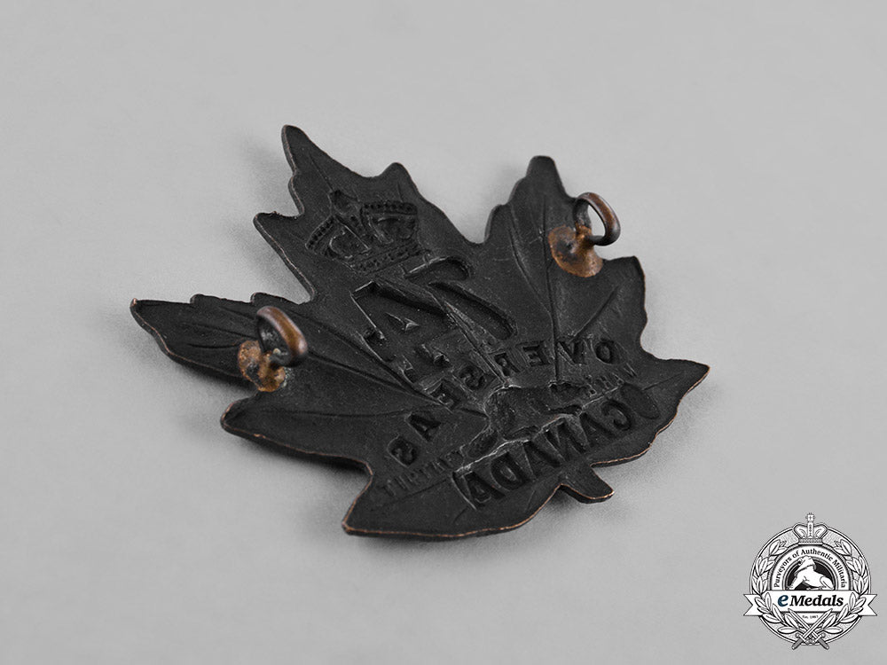 canada._three_infantry_battalion_cap_badges,_c.1915_c18-040087