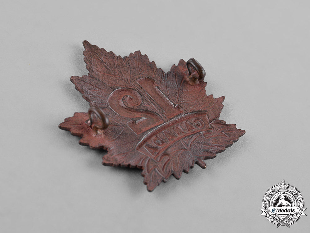 canada._three_infantry_battalion_cap_badges,_c.1915_c18-040088