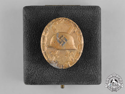 germany,_wehrmacht._a_gold_grade_wound_badge,_with_case,_by_b.h._mayer_c18-041784
