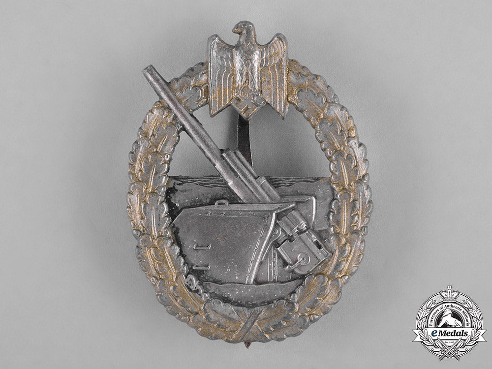 germany,_kriegsmarine._a_coastal_artillery_war_badge_by_schwerin&_sohn_c18-041800