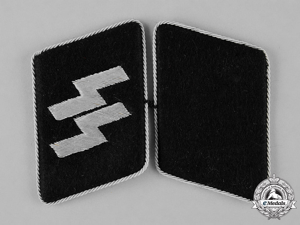 germany,_ss._a_pair_of_mint_and_unissued_ss_officer’s_collar_tabs_c18-042906