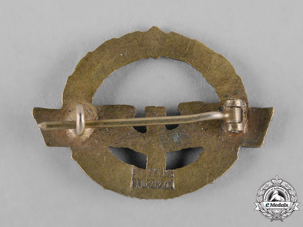 germany,_reichsbahn._a_very_rare_german_female_railway_staff_service_badge,_gold_grade,_c.1944._c18-042952