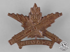 Canada. A Canadian Machine Gun Corps Officer's Cap Badge, Style D With Maple Leaf Design
